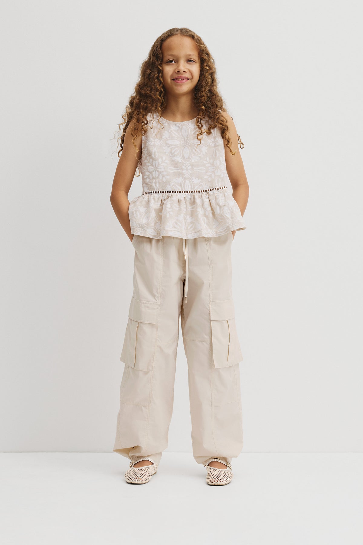 Teen Sleeveless Peplum Top